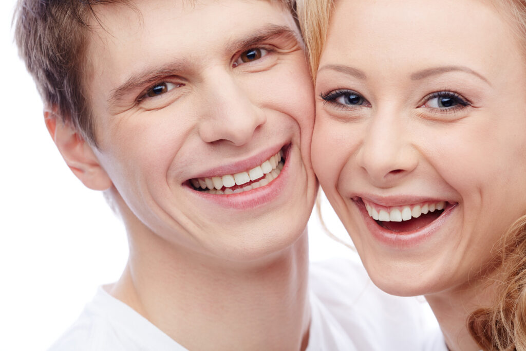 smiling couple on white background